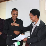 Hon. Prof Anna Tibaijuka(MP) former minister for Lands, Housing and Human Settlement Development hands over office to Hon. William Lukuvi new lands Minister at the ministry of Lands in Dar es salaam on 26/01/2015.