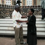 Prof Anna Tibaijuka(MB) akisalimiana na Bw James Rugemalila  mara baada ya kutoka katika misa ya jumapili iliyofanyika kanisa la Kasaidolo,Bukoba