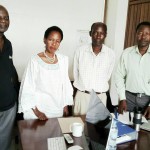 Mh. Anna Tibaijuka katika picha ya pamoja na wakili Dr Rugemeleza Nshala na Prince Bagenda katika ofisi za TAWLAT jijini Dar es salaam